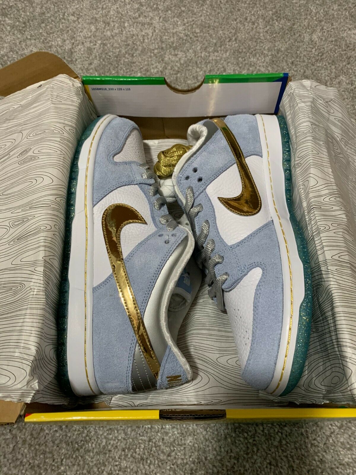 Sean Cliver x Nike SB Dunk Low “Holiday Special”