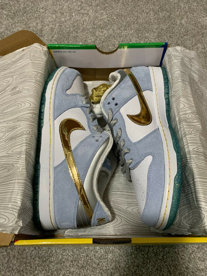 Sean Cliver x Nike SB Dunk Low “Holiday Special”